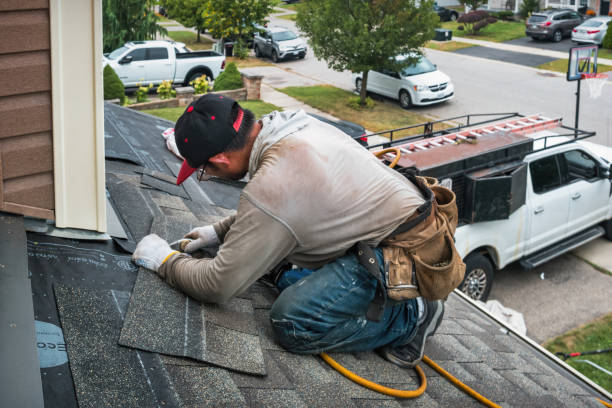 Professional Metal Roofing technician working in Dedham, MA
